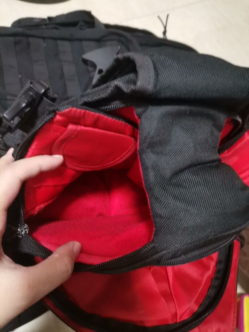 Caden DSLR Camera Sling Bag Black Red (Category: Camera Bags & Carriers) located in Makati City. Submitted by kookybearsstuff (Listing ID 1465818823, Image 3). Description: - Sleek black exterior with a stylish vibrant red interior lining - Well-padded main compartment to keep your camera gear safe and secure - Multiple internal pockets for storing extra memory cards, batteries, and cables - Breathable mesh strap ensures comfortable, all-day carr