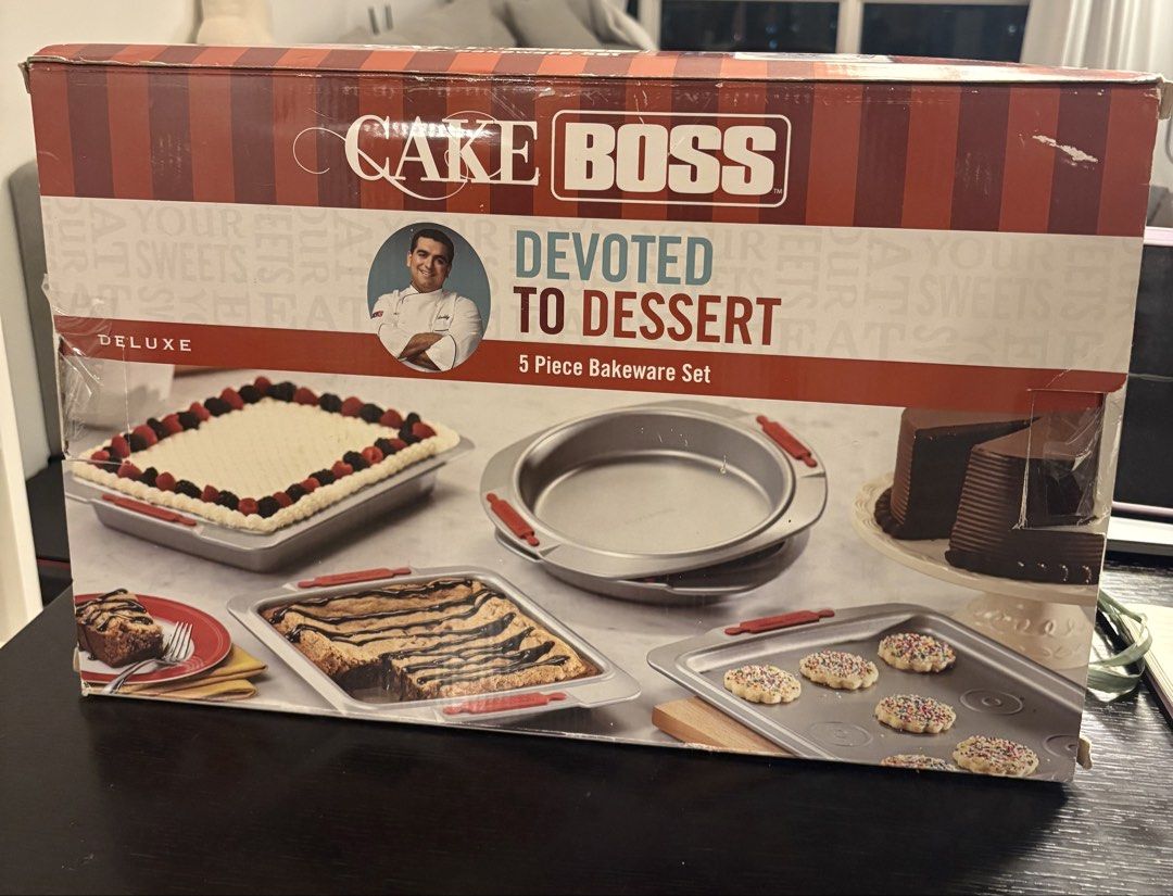 Cake Boss Devoted To Dessert 5-Piece Bakeware Set (Category: Bakeware) located in Manila. Submitted by cebushopper2222 (Listing ID 1465877916, Image 1). Description: Baking set from Cake Boss with five essential pans. Never been used before, packaging has never been opened before. Includes a cookie pan, cake pan, square cake pan, and two round cake pans. Nonstick surfaces inside and out help release food easily. Rolled edges resist warping. Comfo