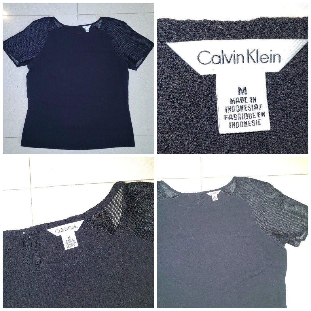 CALVIN KLEIN Blouse with sheer mesh short sleeves (Category: Blouses) located in Barotac Nuevo. Submitted by yorcollections (Listing ID 1465926871, Image 1). Description: CALVIN KLEIN Blouse with sheer mesh short sleeves Size M on tag Length 21 inches Width 25 inches 200php + sf.