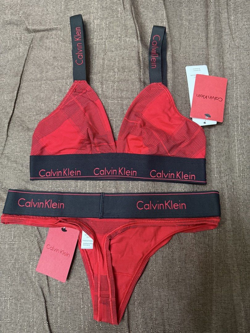 Calvin Klein Red Plaid Bralette and Thong Set (Category: Undergarments & Loungewear) located in Quezon City. Submitted by mt031199 (Listing ID 1465946884, Image 3). Description: - Brand new with original tags attached - Calvin Klein matching bralette and thong set - Festive red plaid pattern - Signature black elastic bands with repeated red logo lettering - Adjustable straps on the bralette for a comfortable fit.