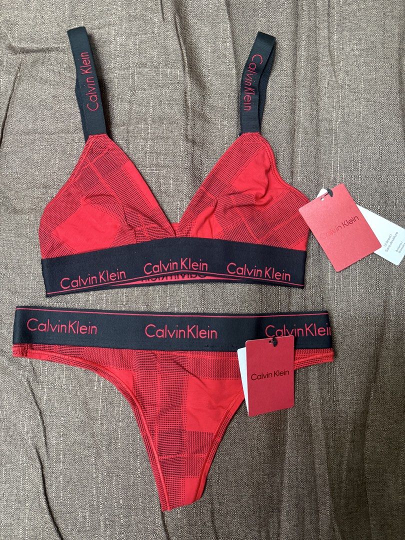 Calvin Klein Red Plaid Bralette and Thong Set (Category: Undergarments & Loungewear) located in Quezon City. Submitted by mt031199 (Listing ID 1465946884, Image 1). Description: - Brand new with original tags attached - Calvin Klein matching bralette and thong set - Festive red plaid pattern - Signature black elastic bands with repeated red logo lettering - Adjustable straps on the bralette for a comfortable fit.
