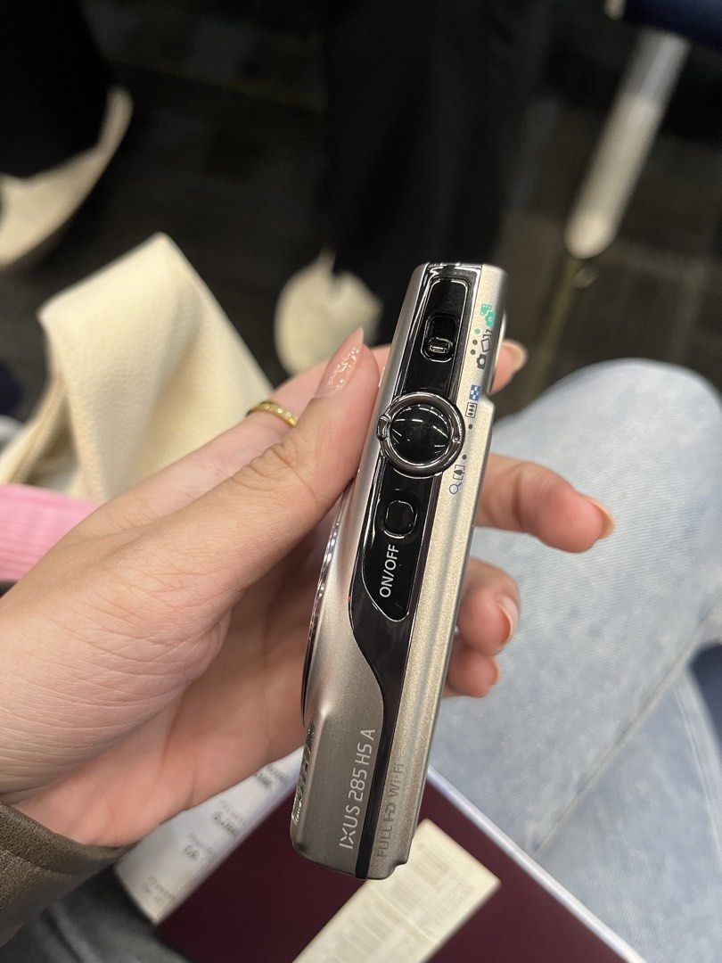 Canon IXUS 285 HS A Silver Digital Camera (Category: Cameras) located in Quezon City. Submitted by angelenergy (Listing ID 1465923719, Image 3). Description: Barely used No issue Still with box Has screen protector Bought from Henry's Camera Photo - MAY 2026.
