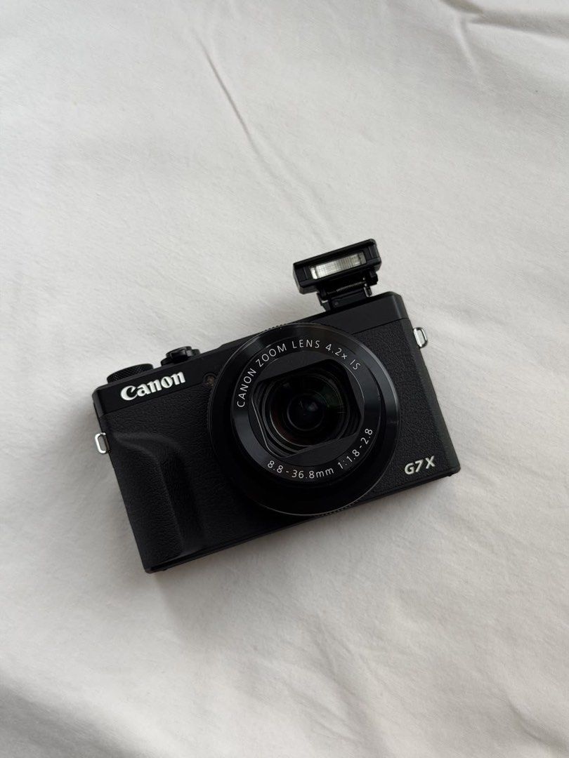 Canon PowerShot G7 X Mark III Digital Camera (Category: Cameras) located in Manila. Submitted by yensushii (Listing ID 1465865836, Image 1). Description: Canon G7X Mark III 📸 Compact but DSLR-like quality – perfect for vlogs, travel, and everyday shots Inclusions: * Canon G7X camera (Unit) * 32gb SD Card * Battery * Type-C cable (Charger) * Silicone Case * Wrist Strap * Tempered Glass (Already Installed) * Box * Receipt ✅ Fully working / ready t