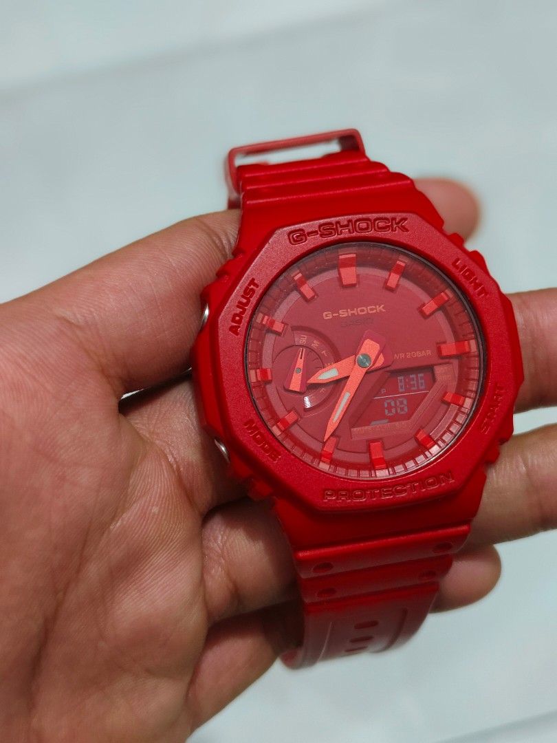 Casio G-Shock GA-2100 Red Watch (Category: Men's Watches) located in Manila. Submitted by daddyriches (Listing ID 1465891761, Image 1). Description: - Model: Casio G-Shock GA-2100 - Color: Striking bright red (dial, bezel, and strap) - Build: Tough carbon core guard structure with durable resin strap and bezel - Display: Combo analog and digital dial - Water Resistance: Up to 20 bar (200 meters) - Closure: Standard buckle - Condition: Clean case 
