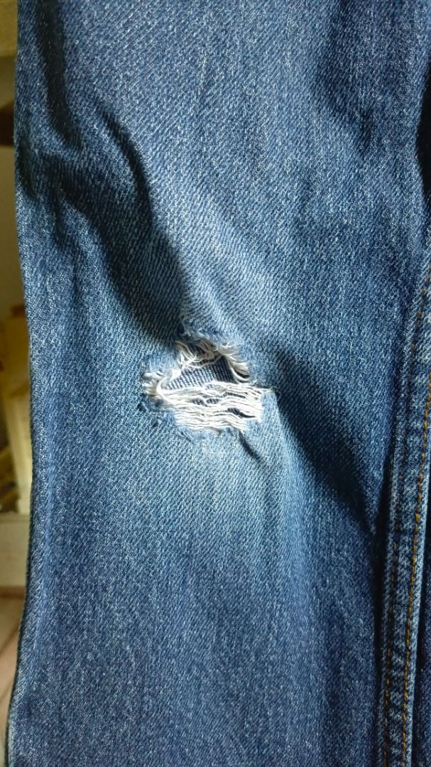 Cat & Jack Relaxed Straight Jeans Size 5 (Category: Jeans) located in Paranaque City. Submitted by cheawbeaw (Listing ID 1465807828, Image 2). Description: - Brand/Style: Cat & Jack relaxed straight denim jeans - Color: Dark blue - Size: 5 (label inside) - Origin: Made in Vietnam - Details: Single distressed rip on right knee, classic 5-pocket design, button closure, and belt loops - Condition: Good staple piece for everyday wear.