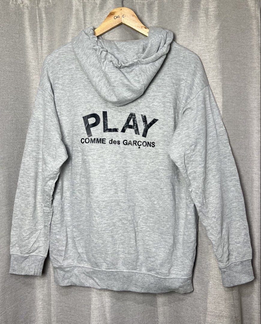CDG Play hoodie w spellout logo (Category: Coats, Jackets and Outerwear) located in General Trias. Submitted by luxfinds2019 (Listing ID 1465845306, Image 2). Description: Cdg play! 1299 shipped Medium to large 22by27 Excellent condition 💯 Loc laguna Pm.