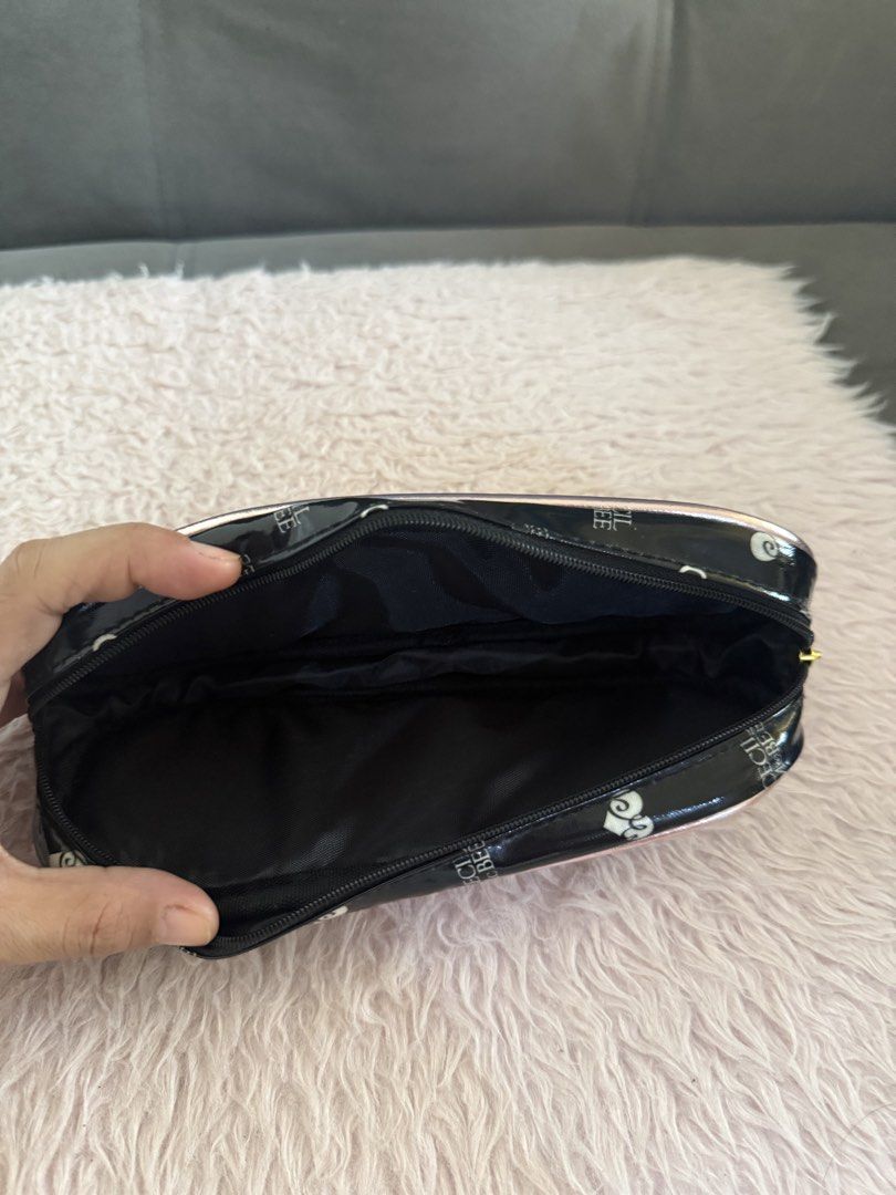 CECIL McBEE Quilted Black and Pink Pouch (Category: Purses & Pouches) located in Malolos. Submitted by gb_21895 (Listing ID 1465951715, Image 3). Description: - Brand: CECIL McBEE - Material: Black patent leather with chic diamond quilting - Design: All-over brand monogram and heart print pattern - Hardware: Rose gold metallic trim, matching logo plate with 'My Sweet Closet' text, and gold-tone zipper pull - Closure: Secure zip-around closure - I
