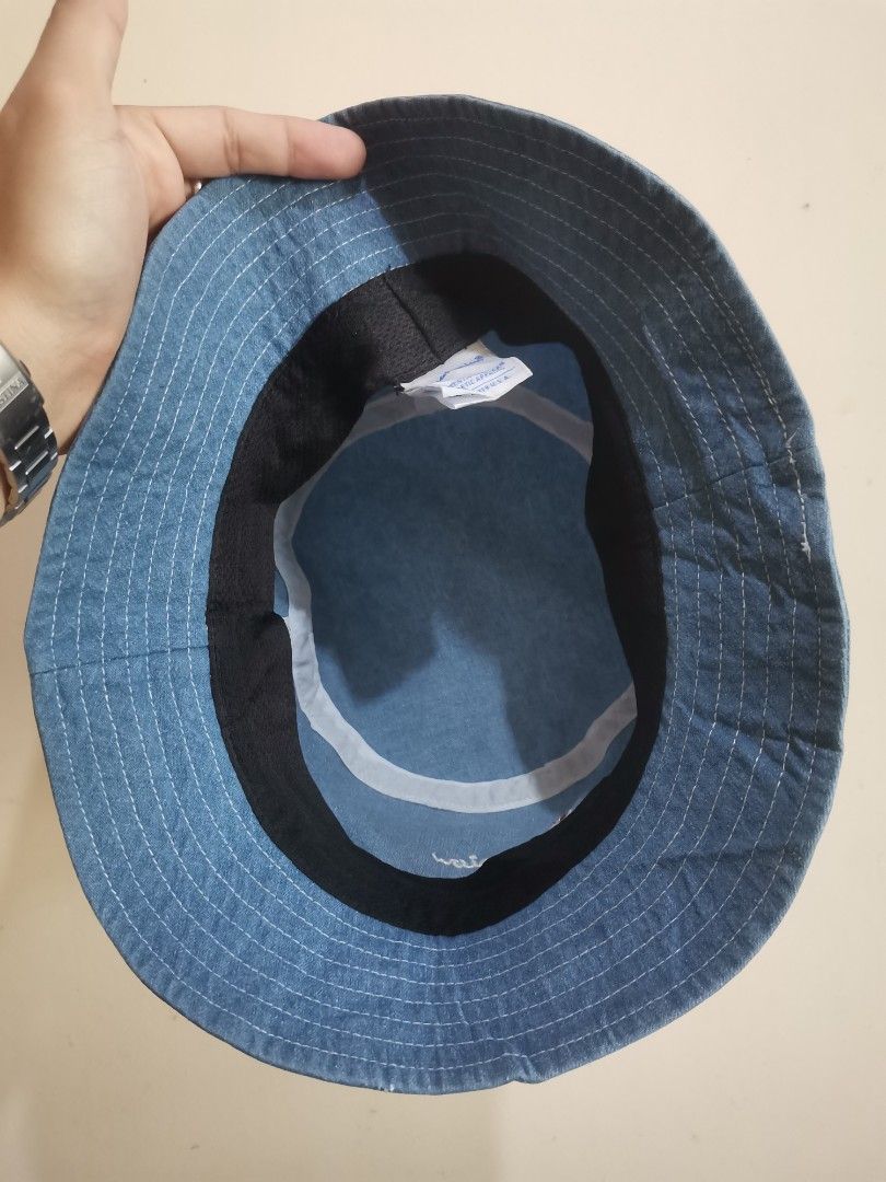 Champion denim bucket (Category: Caps & Hats) located in Davao. Submitted by marcio17 (Listing ID 1465762677, Image 3). Description: Excellent condition Med to large fit Issue: oil stain sa dome pro d halata 750 freeshipping only.