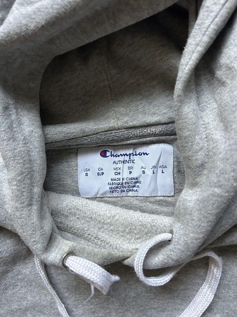 Champion Gray Hoodie (Category: Hoodies) located in Manila. Submitted by wenttttt (Listing ID 1465945468, Image 3). Description: 20.5 x 25 No issue.