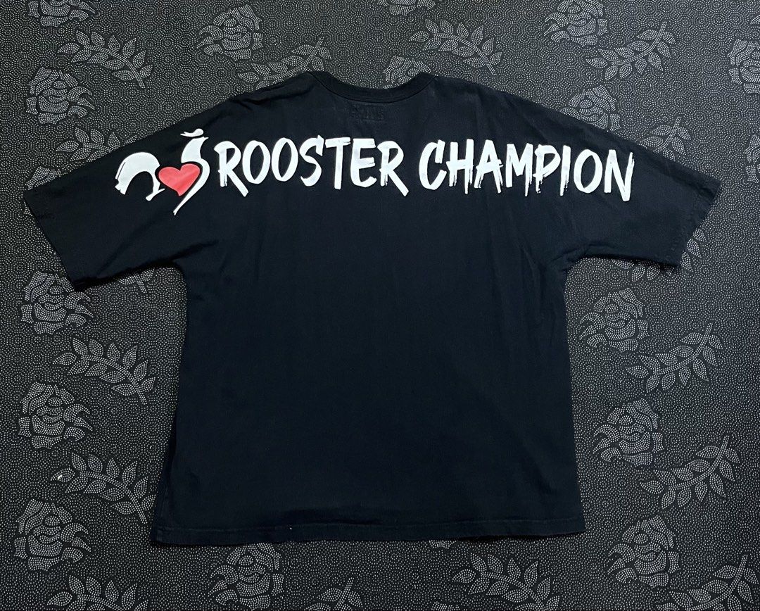 Champion Rooster graphic t-shirt (Category: Tshirts & Polo Shirts ) located in Porac. Submitted by macky.ron (Listing ID 1465795035, Image 1). Description: Length:27.5 Width: 21 Condition: Good Color rate: 8.5 Issue (s): none Complete Tags.