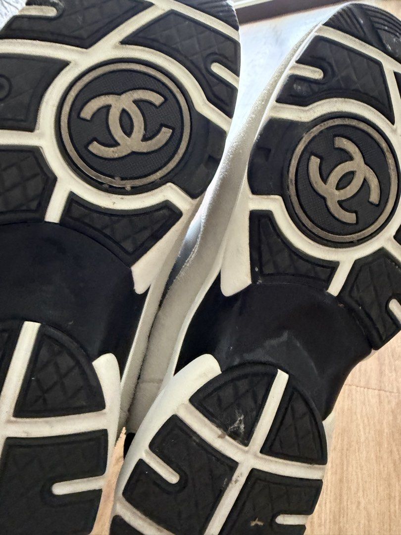Chanel CC Logo White Blue Suede Sneakers (Category: Sneakers) located in Quezon City. Submitted by welllovedkids (Listing ID 1465795554, Image 2). Description: - Authentic Chanel sneakers in white, blue, and silver Anyone buying project shoes? This is an original C rubber shoes but noticed leather is peeling. If you want to have it repaired or use it as project shoes, selling low for 2.5k Location QC MOP: Gcash.