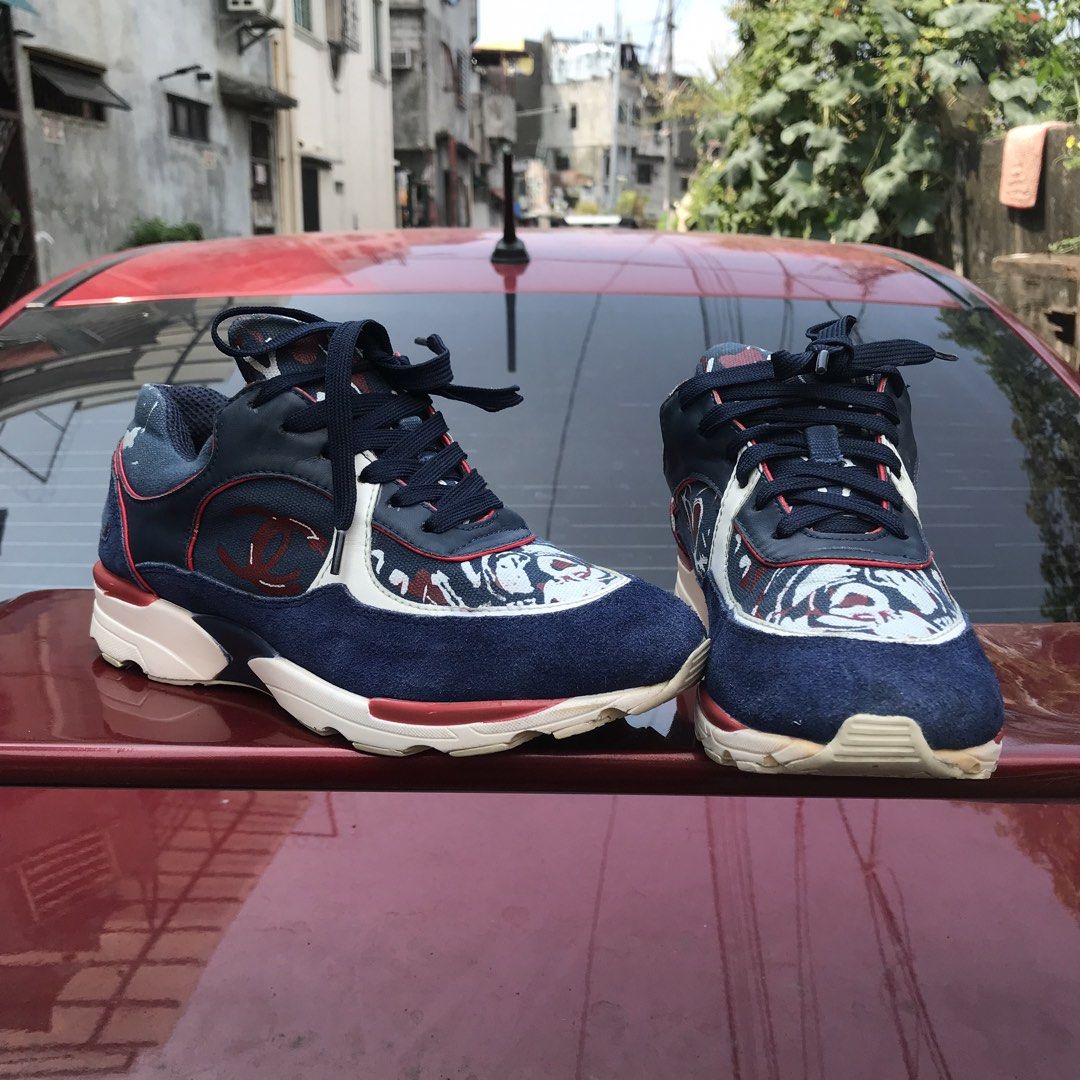 CHANEL💕 (IG26582 CC Logo Sneakers)! (Category: Sneakers & Footwear) located in Bulacan. Submitted by xxboutique2428 (Listing ID 1465835725, Image 3). Description: CHANEL IG26582 CC Logo Sneakers Condition: Pre-Owned / Used With Care Size: EU 39 Style Code: IG26582 Color: Navy Blue / Red / White Style: Low-top fashion sneakers Design: Interlocking CC logo with multicolor detailing Closure: Lace-up Material: Suede/leather/textile construction.