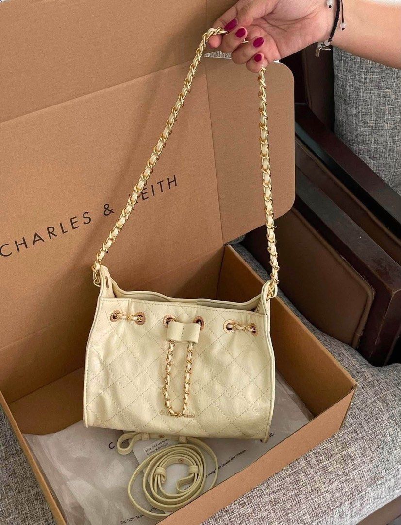 Charles & Keith Duo Drawstring Bag (Category: Shoulder Bags) located in Pasig City. Submitted by 3dsbagcollectionbydiane (Listing ID 1465858473, Image 3). Description: ONHAND and Ready to Ship ✨ ₱1050 Add ₱80 for Paper Bag MOD: Lalamove, Grab, Angkas Padala, etc. 🎀TrieeDeesCollection for proof of deliveries/transactions and other available items. PM for more questions. Thank you! 🤍 📍Pasig/Manila.