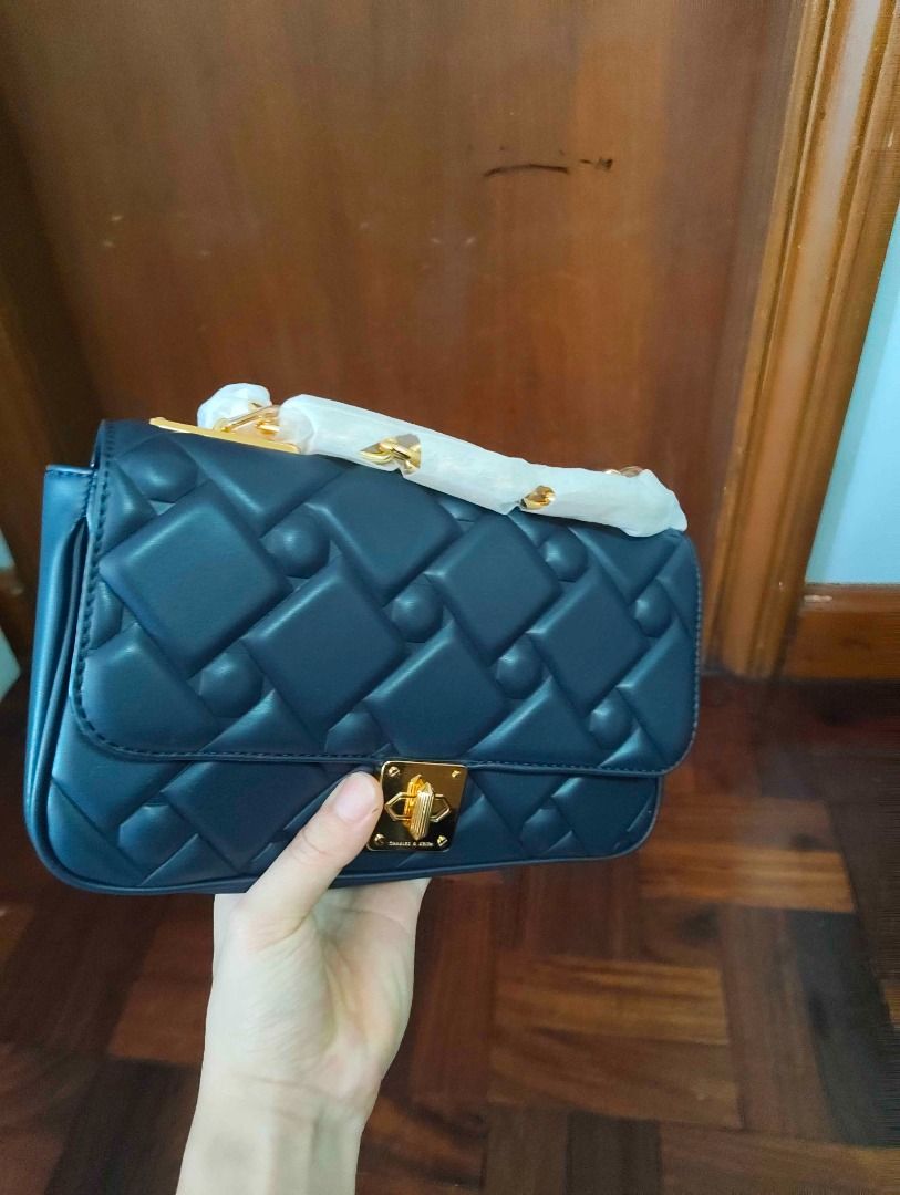Charles & Keith Quilted Chain Bag (Category: Shoulder Bags) located in Quezon City. Submitted by luisykeh (Listing ID 1465823638, Image 1). Description: Brand new Charles & Keith Quilted Chain Bag. An elegant, modern piece featuring a premium quilted finish and a versatile gold-tone chain strap that converts from shoulder to crossbody wear. Condition: Brand New Inclusions: Bag + Original Dust Bag Payment: GCash or Cash Delivery: Pickup or via cou