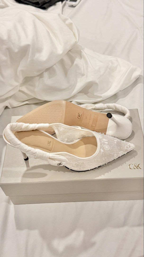 Charles & Keith White Mesh Slingback Pumps (Category: Heels) located in Manila. Submitted by daffney00 (Listing ID 1465889565, Image 2). Description: Size 38. Never used / only fitted. Bought for 5,350..