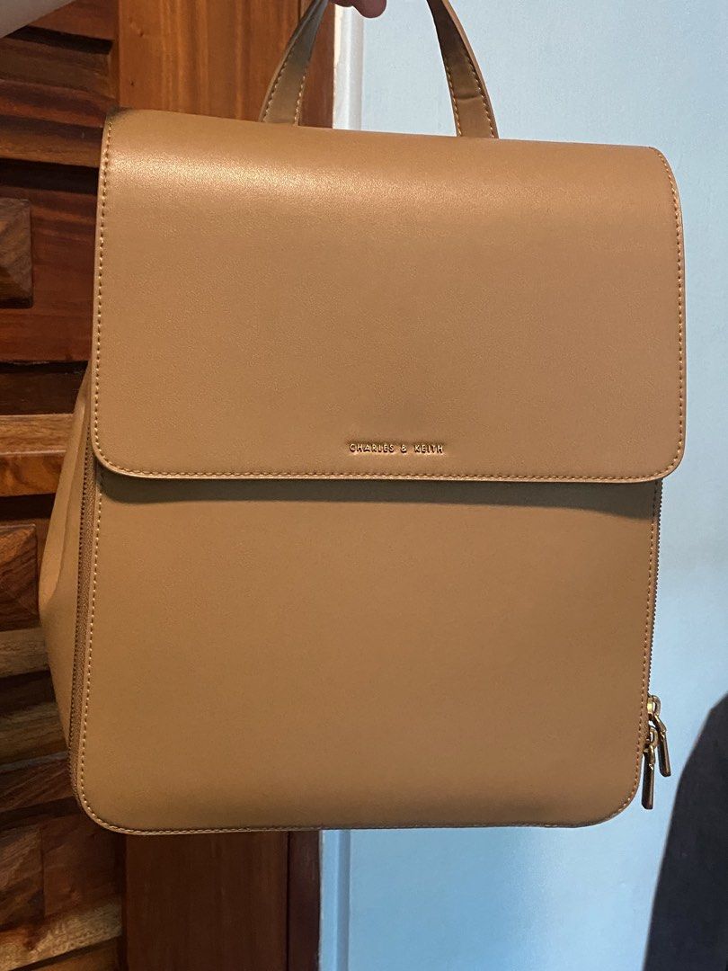 Charles and Keith Octavia Backpack | Leather Backpack | Authentic (Category: Backpacks) located in Cavite. Submitted by kate.718 (Listing ID 1465829265, Image 1). Description: Recently bought this from another seller. I changed my mind and want a different color. Comes with dust bag..