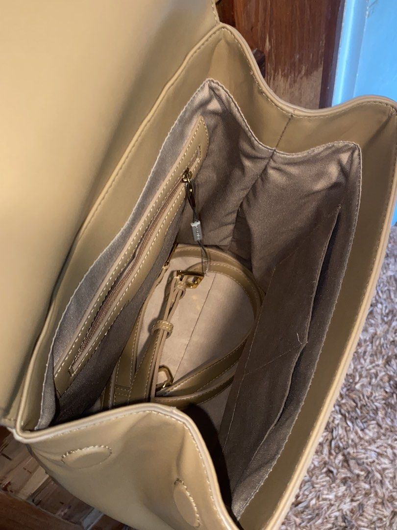 Charles and Keith Octavia Backpack | Leather Backpack | Authentic (Category: Backpacks) located in Cavite. Submitted by kate.718 (Listing ID 1465829265, Image 3). Description: Recently bought this from another seller. I changed my mind and want a different color. Comes with dust bag..
