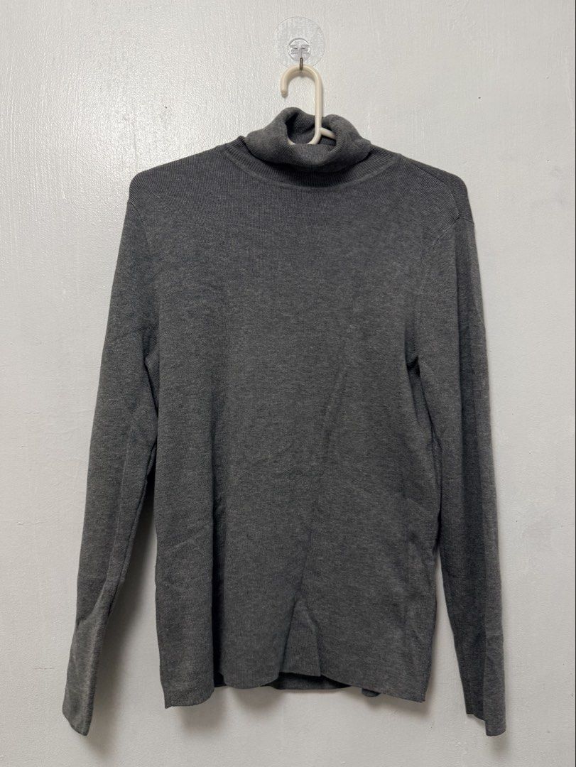 Chico's Grey Turtleneck Sweater (Category: Longsleeves) located in Mandaluyong City. Submitted by nftp24 (Listing ID 1465851560, Image 1). Description: - Brand: Chico's - Size: 1 (fits Medium) - Color: Classic Grey - Material: 88% Rayon, 12% Polyester (Soft & stretchy fabric) - Style: Long sleeves, ribbed texture, high turtleneck neck - Condition: Clean, excellent, and ready to wear.