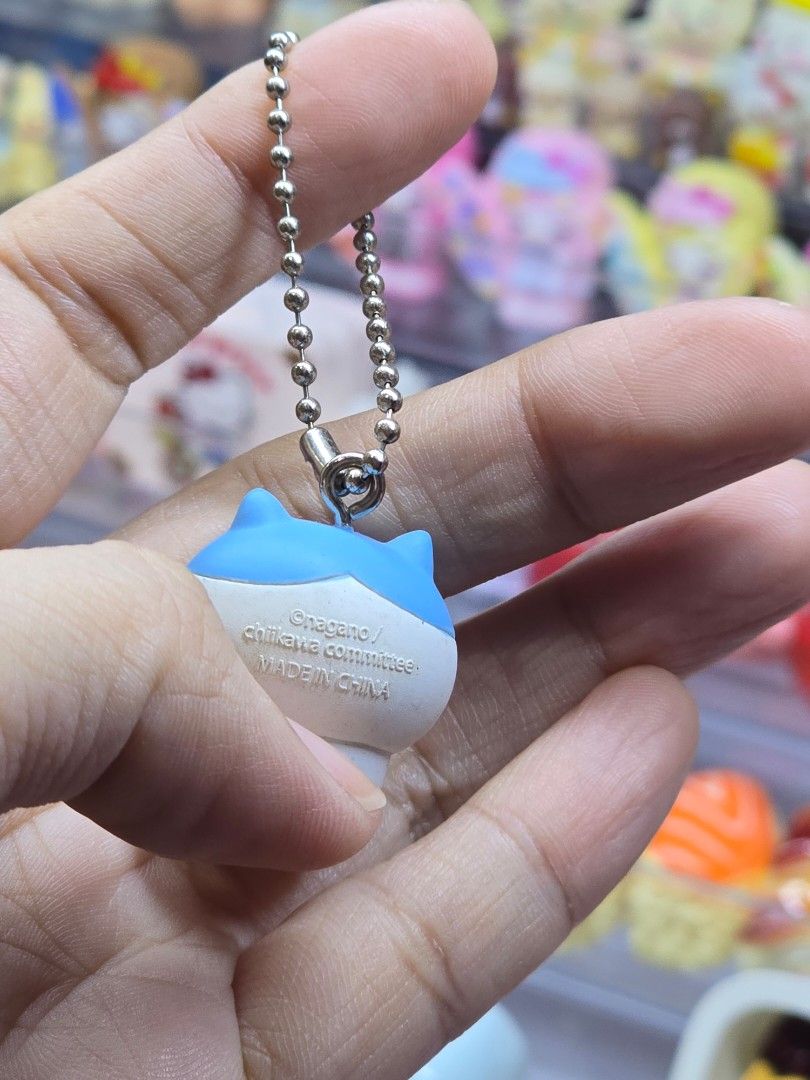 Chiikawa Hachiware Figure Keychain (Category: Designer & Blind Box Toys) located in Batangas. Submitted by belleandbela (Listing ID 1465900874, Image 3). Description: - Authentic Nagano Chiikawa Hachiware merchandise - Features a cute smiling expression with pink cheeks - Equipped with a sturdy silver-tone ball chain - Compact and lightweight, ideal for bags, pouches, or keys.