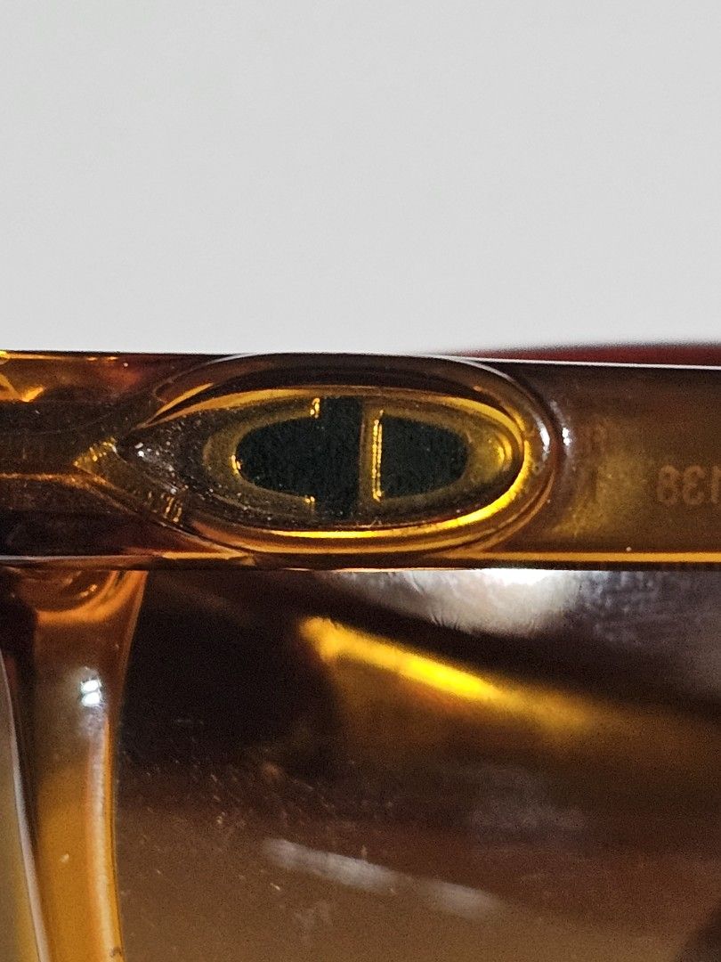 Christian Dior 2138 Eyeglass sunglass (Category: Sunglasses & Eyewear) located in Manila. Submitted by onlinesmartshopping12 (Listing ID 1465892433, Image 3). Description: - Authentic Christian Dior sunglasses - Classic design - Brown gradient lenses - Amber frame - Model: 2138 - Made in Germany - CD logo on temples - Vintage accessory -no case.