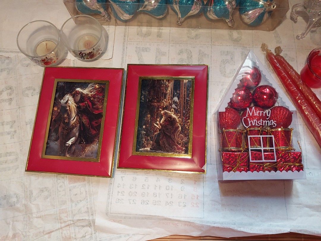 Christmas decor bundle with ornaments and picture frames (Category: Wall Decor) located in Manila. Submitted by bryantoyshop (Listing ID 1465760160, Image 2). Description: - Festive holiday decor bundle, includes everything pictured - 2x Red picture frames with Christmas art - Sparkly red and blue baubles in packaging - 1x Clear plastic reindeer figure - 2x Long red taper candles with matching red glass holders - 2x Glass tealight holders.