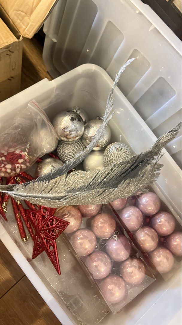 Christmas Tree Decorations Bulbs Flowers Leaves Set (Category: Artificial Plants & Flowers) located in Manila. Submitted by _purpleloved (Listing ID 1465882145, Image 2). Description: - Christmas tree decor bundle for a complete holiday setup - Includes silver and gold glitter leaves and floral picks - Features beaded branch sprays and festive red stars - Comes with hanging baubles in light pink, magenta, and silver - Packed in clear plastic boxe