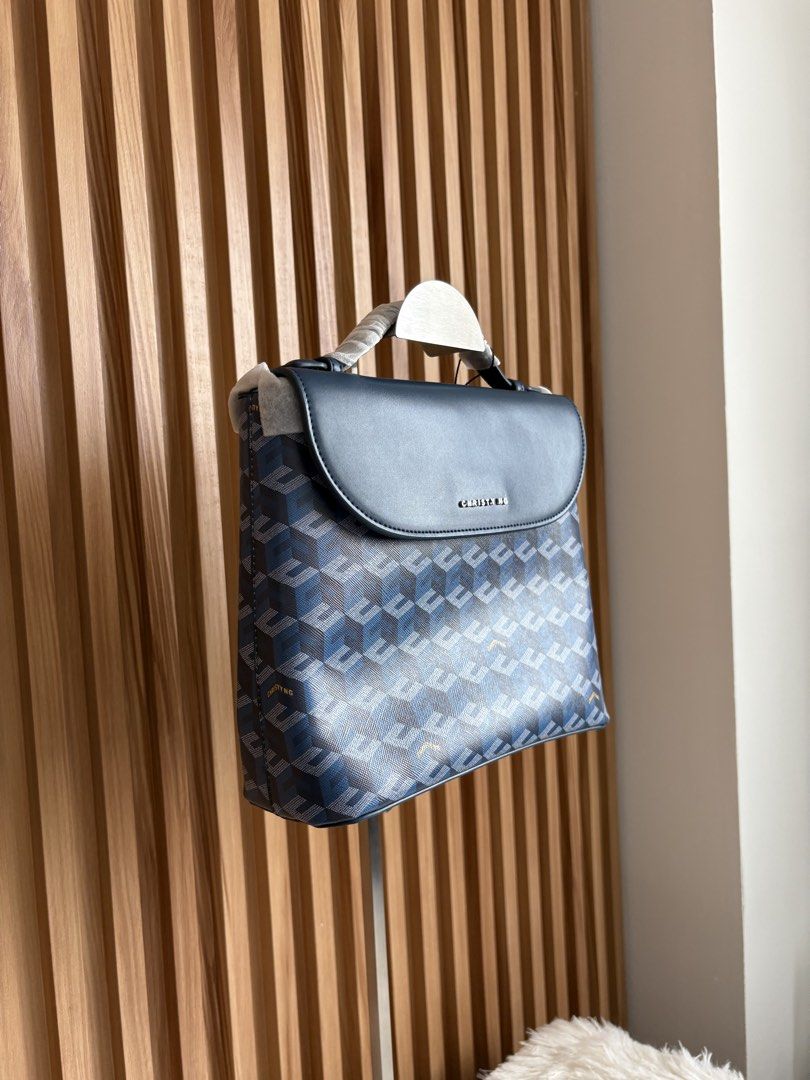 CHRISTY NG JULIO BACKPACK IN BLUE (Category: Backpacks) located in Imus. Submitted by dumpitlikeaqueen (Listing ID 1465793400, Image 2). Description: • From Singapore • With tag, dust bag & paper bag • Open for layaway • Instagram Shop: @dumpitlikeaqueen.