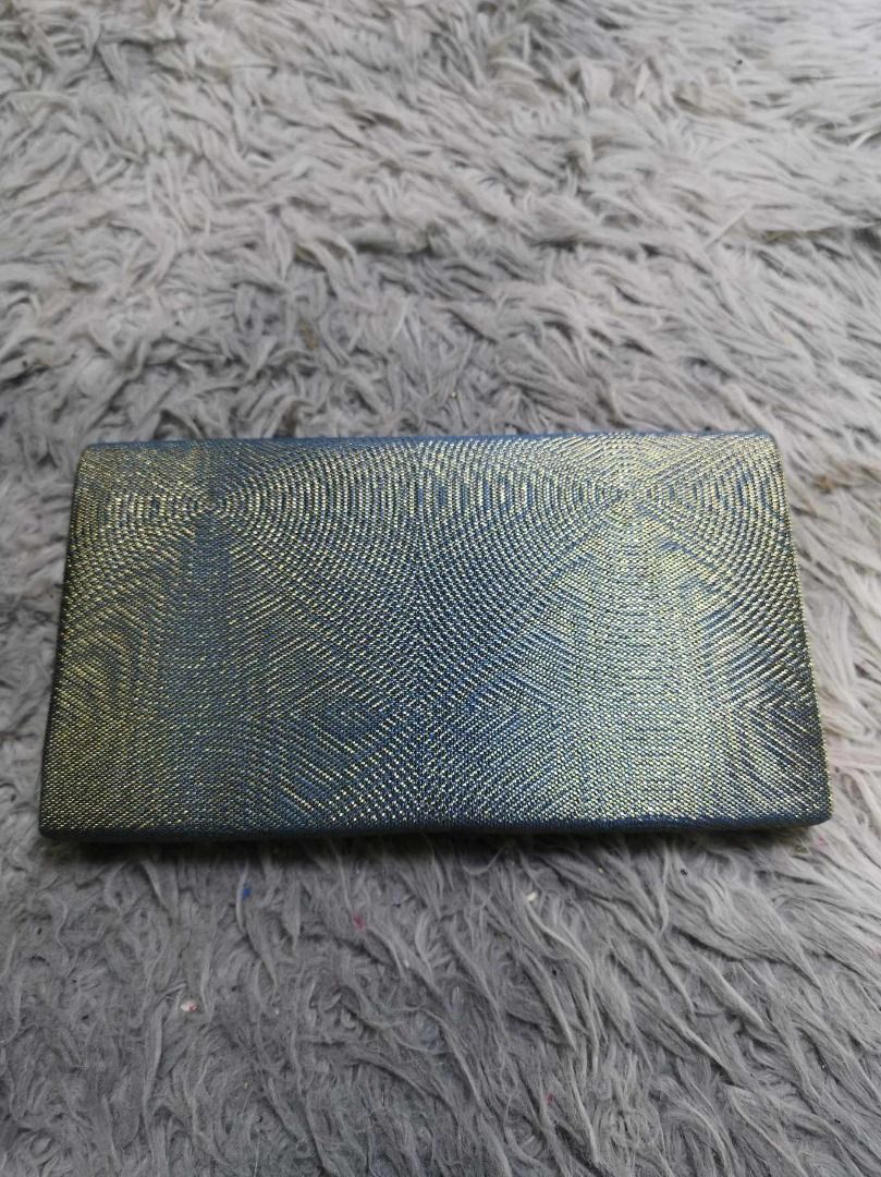 Circular Wave pattern Sleek Blue Clutch (Category: Clutches) located in Santa Cruz. Submitted by jmy_surplus.2 (Listing ID 1465883600, Image 1). Description: Size ; L - 5.3 W - 9 Color ; Blue Type ; Clutch Brand ; No brand Material ; Synthetic Style ; Sleek Blue Snap Closure Clutch LR 129 JMY 5 Batch #224.