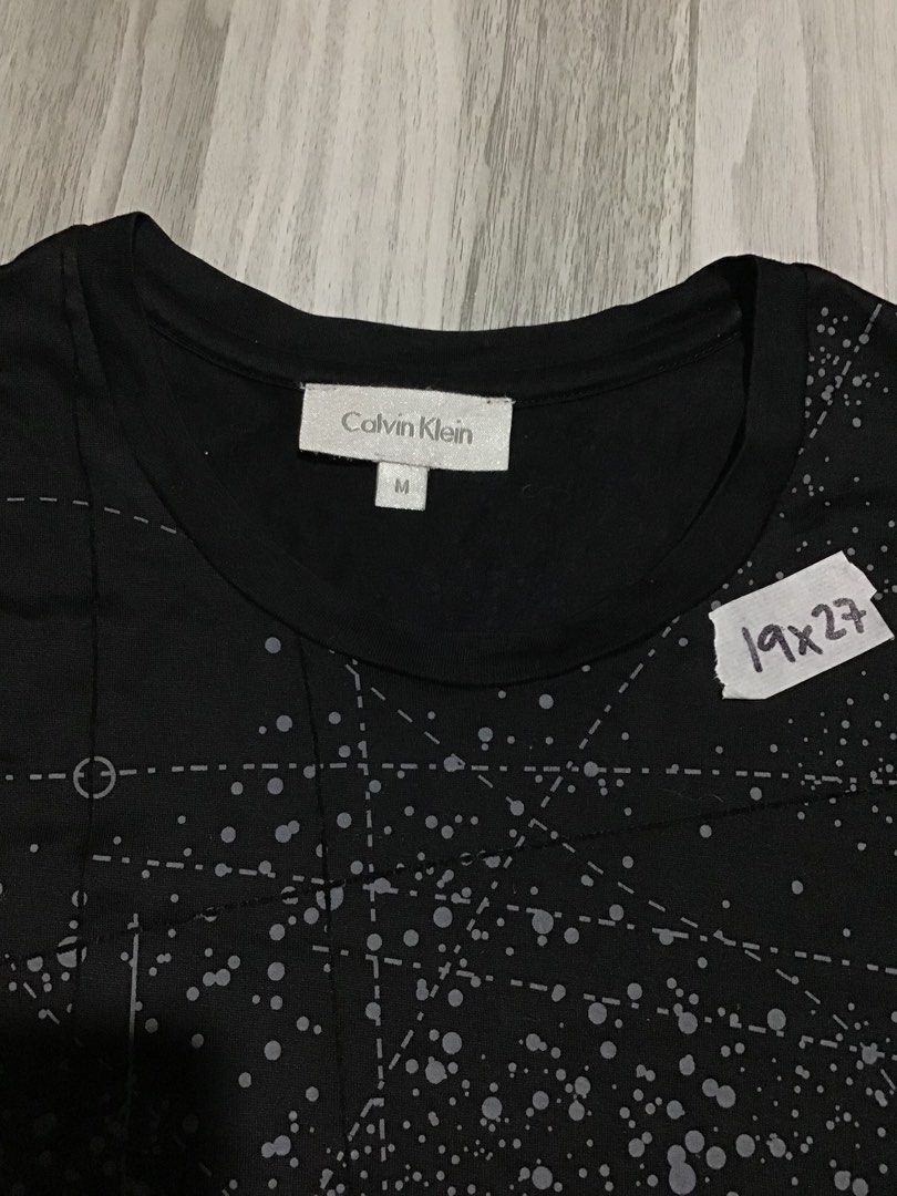 Ck black men’s tee (Category: Formal Shirts) located in Davao. Submitted by ljay.thriftedfinds (Listing ID 1465796808, Image 3). Description: .