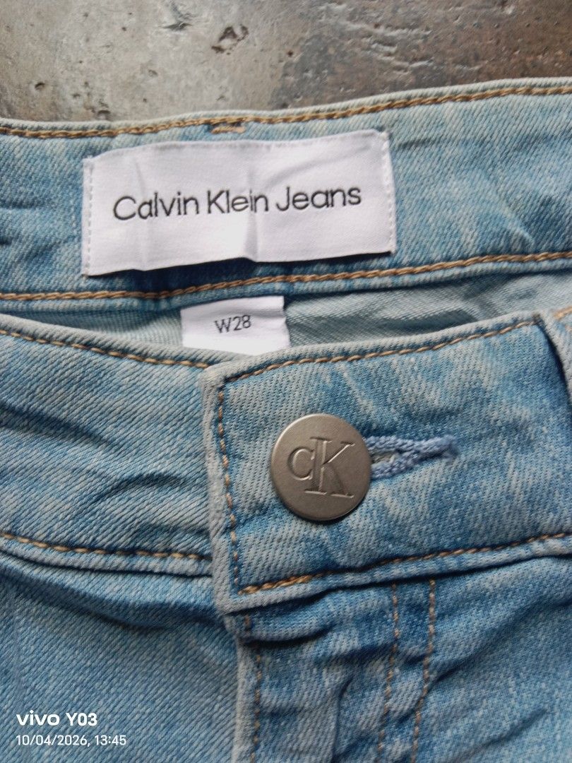 CK Light Wash Jeans Calvin Klein (Category: Jeans) located in Cabuyao City. Submitted by blake657 (Listing ID 1465808938, Image 3). Description: - Brand: Calvin Klein - Wash: Light denim - Cut: Classic straight leg - Details: Signature cK logo tag on coin pocket, contrast stitching - Pockets: Functional front and back pockets - Style: Great daily staple, easy to match with tees and sneakers.