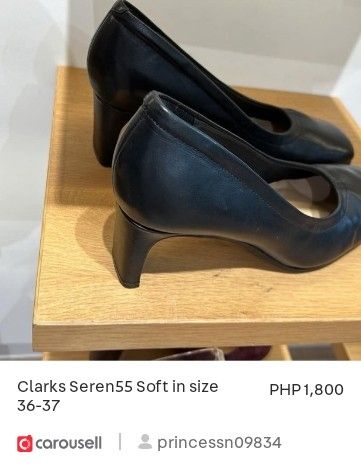 Clarks Seren55 Soft Black Heels Size 36-37 (Category: Heels) located in Cotabato. Submitted by princessn09834 (Listing ID 1465808393, Image 2). Description: - Brand: Clarks (Model: Seren55 Soft) - Color: Classic Black - Material: Smooth, high-quality leather - Design: Elegant square toe and slip-on style - Heel: Comfortable mid-height block heel - Condition: Well-maintained with clean soles - Versatility: Perfect for office wear and everyday styl