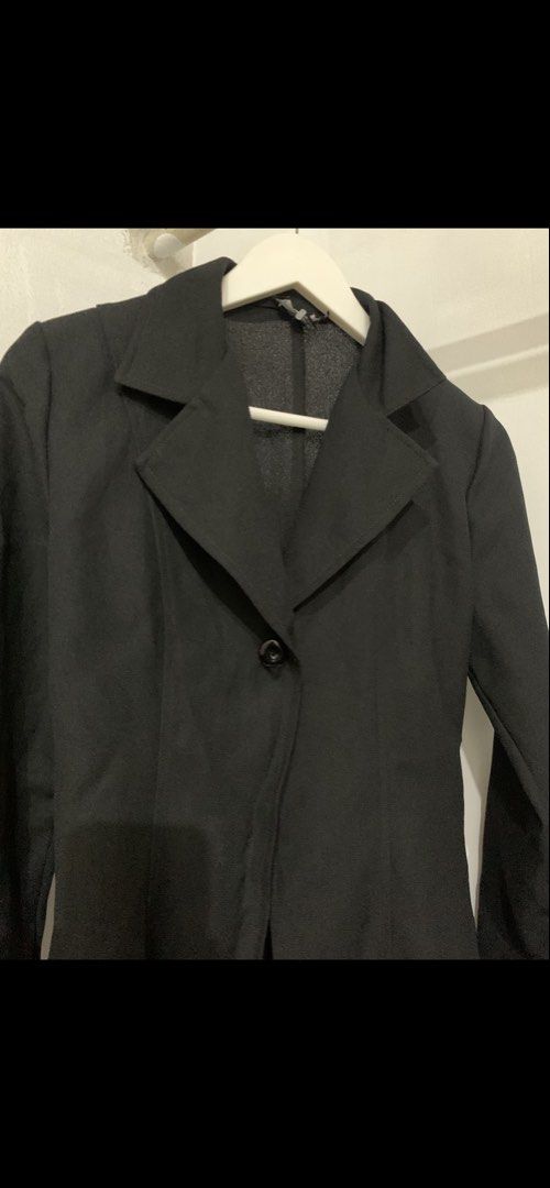 Classic Black Single Button Blazer Jacket (Category: Coats, Jackets and Outerwear) located in Manila. Submitted by spaceshop12345 (Listing ID 1465859064, Image 3). Description: - Color: Black - Style: Single-button blazer with classic lapel collar - Fit: Structured fit with clean tailoring and long sleeves - Fabric: Lightweight and comfortable - Versatility: Easy to style for work or casual everyday wear.