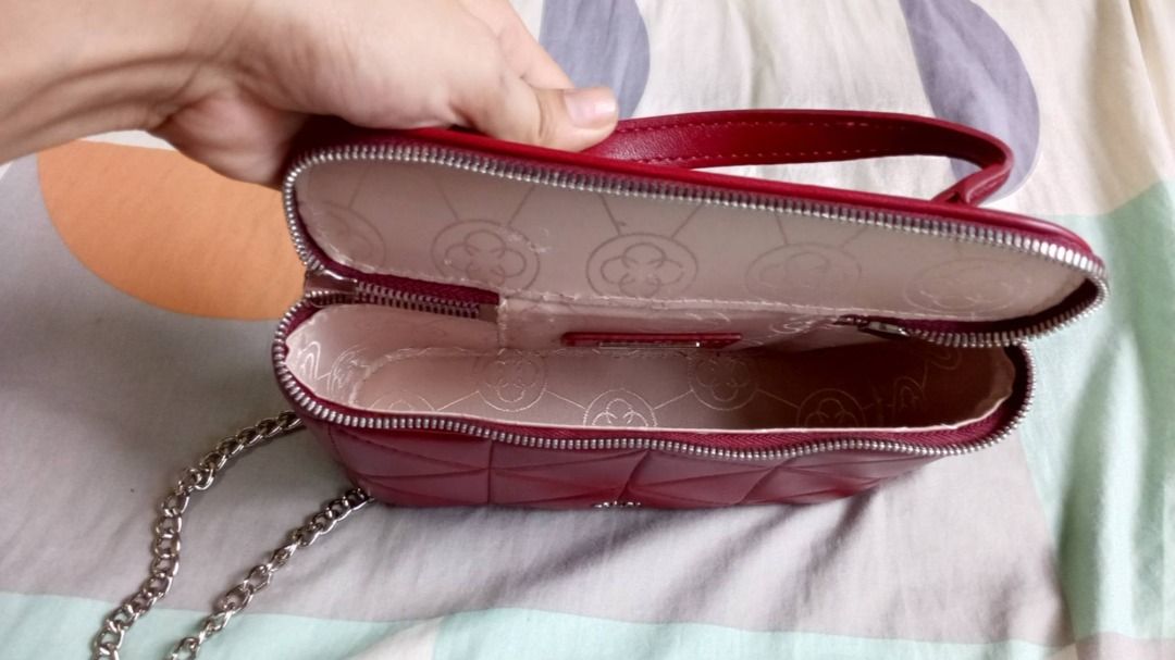 CLN Quilted Maroon Vanity Bag with Chain Strap (Category: Luxury Bags & Wallets) located in Quezon City. Submitted by pyress (Listing ID 1465948458, Image 2). Description: - Brand: CLN Handbag with zip-around closure Interior: 1 slip pocket Exterior: 1 optional chain crossbody strap Synthetic leather & fabric exterior, fabric lining interior Length - 8.60" Width - 2.60" Height - 4.60" Handle Drop - 2.60" Strap Drop - 23.50" Not used .