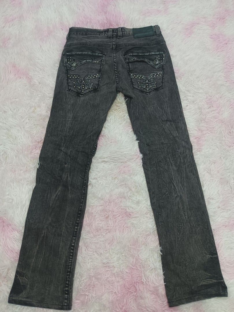 Cloud 72 Black Washed Jeans Size 30 (Category: Jeans) located in Jolo. Submitted by zah-zah (Listing ID 1465784399, Image 2). Description: - Brand: Cloud 72 - Size: 30 - Style: Straight leg, Y2K aesthetic - Color: Dark grey washed - Details: Detailed stitching on back pockets, studded embellishments - Features: Branded button closure and leather patch on back waistband.