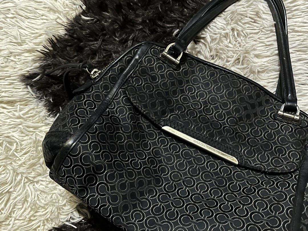 Coach Black Monogram Satchel Handbag (Category: Luxury Bags & Wallets) located in Manila. Submitted by strwb.clo (Listing ID 1465881585, Image 2). Description: ‼️READ FIRST BEFORE BUYING‼️ Bag: Coach (legit) Important Notes: Galing pa siyang U.S also, manage your expectations since it is a PRELOVED bag. - Used this mga 3 times specifically, if there’s occasion lang. - There’s FLAWS. (Minimal scratches sa outer sa may leather part.) See the pictur