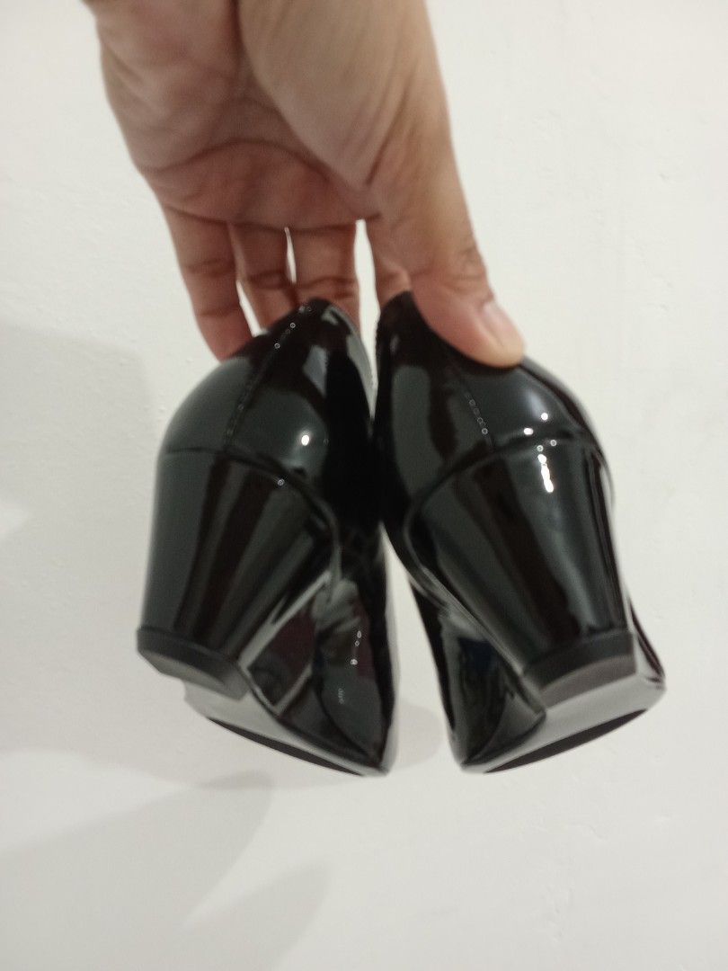 Coach black patent leather wedge heels (Category: Wedges) located in Quezon City. Submitted by jane019 (Listing ID 1465907391, Image 3). Description: - Brand: Coach - Style: Hidden wedge heels with round toe - Material: Clean black patent leather - Details: Luxurious gold inner lining with Coach stamped on footbed - Occasion: Ideal for work, corporate wear, or formal events - Condition: Well-maintained and ready to wear Actual Pics Posted Bought 