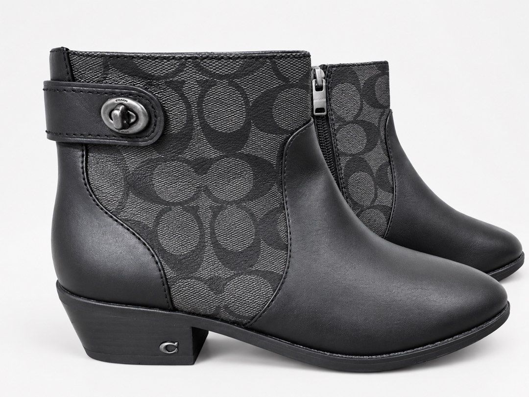 Coach Deni Bootie (Category: Boots) located in Digos. Submitted by ijael1225 (Listing ID 1465920247, Image 2). Description: - Brand: Coach (Deni Bootie) - Color: Black with signature monogram canvas panels - Closure: Convenient side zipper - Details: Chic ankle buckle accent - Heel: Comfortable low block heel - Material: Premium leather and canvas combination - Condition: Excellent/Well-maintained - Shipping or Meet-up available across PH.