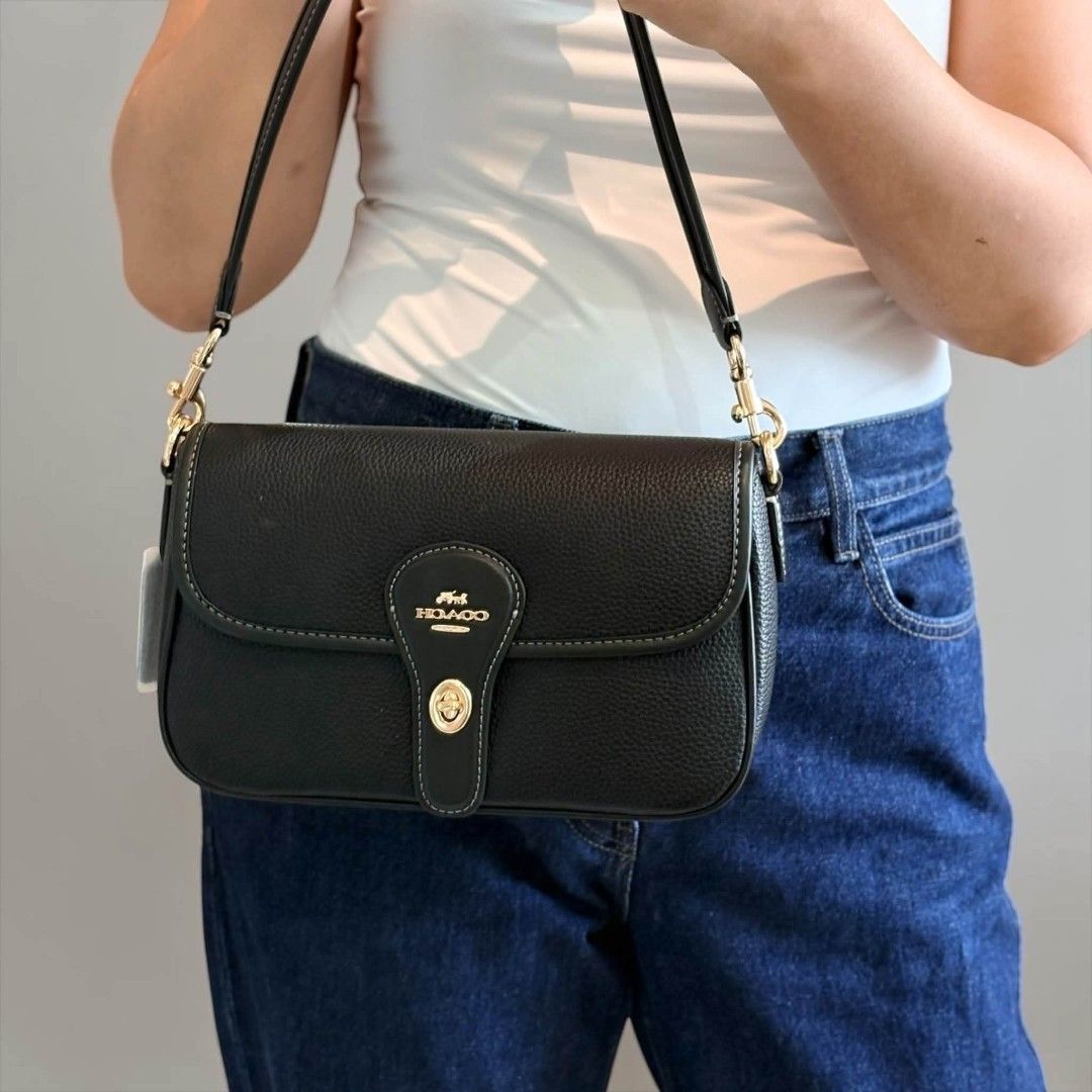 Coach Hadley Crossbody in Black (Category: Cross-body Bags) located in Quezon City. Submitted by bagsboutiqueph (Listing ID 1465803307, Image 2). Description: LAST PRICE POSTED. LIMITED STOCKS! BRANDNEW WITH INCLUSIONS. COLOR MAY SLIGHTLY VARY IN ACTUAL DUE TO LIGHTING AND CAMERA SETTING. OTHER PHOTOS WILL BE SEND DURING PURCHASE AND FOR SURE BUYERS ONLY. WHEN IN DOUBT, DO NOT ORDER. THANK YOU..