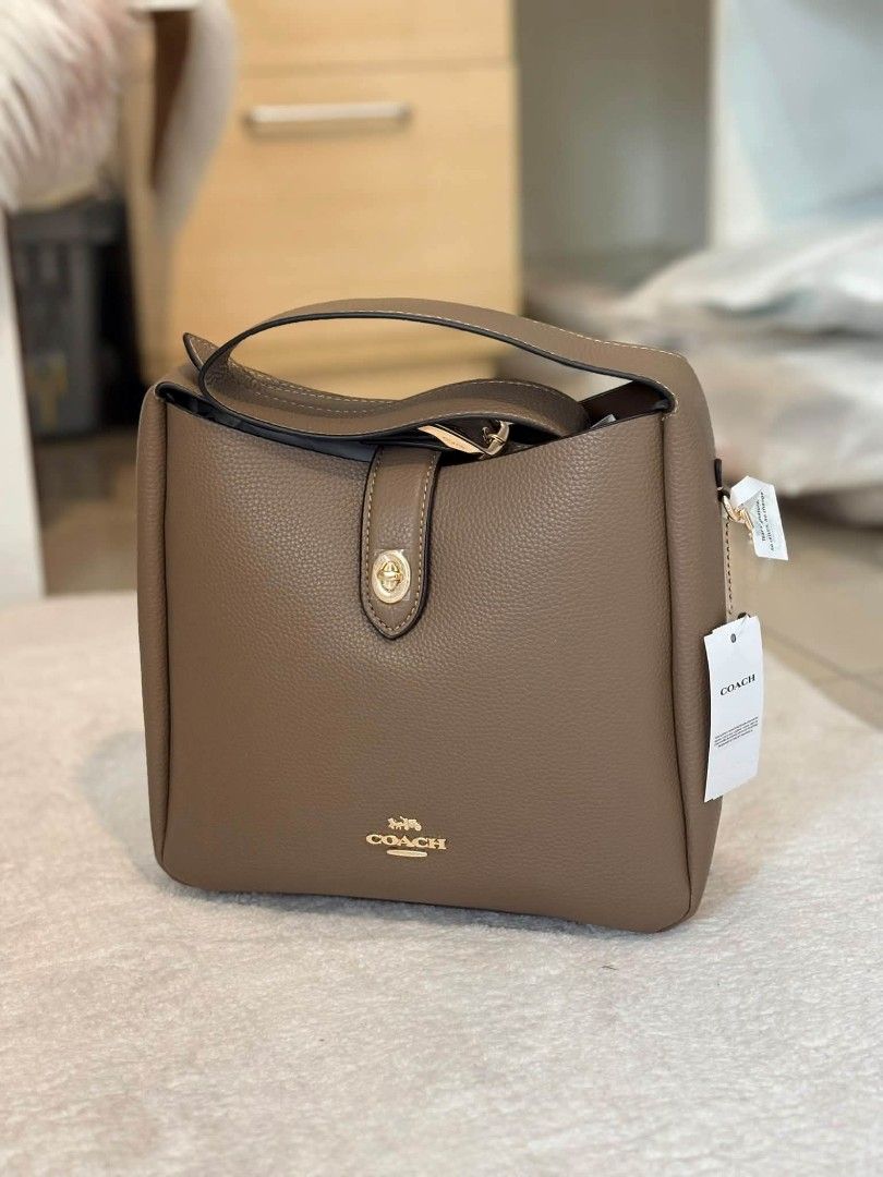Coach Hadley Hobo in Taupe (Category: Shoulder Bags) located in Quezon City. Submitted by bagsboutiqueph (Listing ID 1465785390, Image 1). Description: LAST PRICE POSTED. LIMITED STOCKS! BRANDNEW WITH INCLUSIONS. COLOR MAY SLIGHTLY VARY IN ACTUAL DUE TO LIGHTING AND CAMERA SETTING. OTHER PHOTOS WILL BE SEND DURING PURCHASE AND FOR SURE BUYERS ONLY. WHEN IN DOUBT, DO NOT ORDER. THANK YOU..