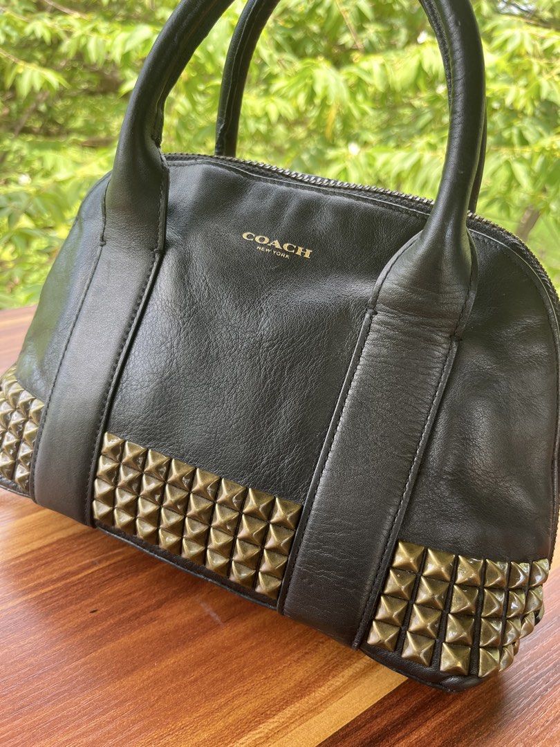 Coach handbag/sling bag (Category: Cross-body Bags) located in Oroquieta. Submitted by mightyfalcon.f3b3e6 (Listing ID 1465807604, Image 2). Description: near medium genuine leather ykk zip,intact code provided blak leather sling strap(tory burch) .