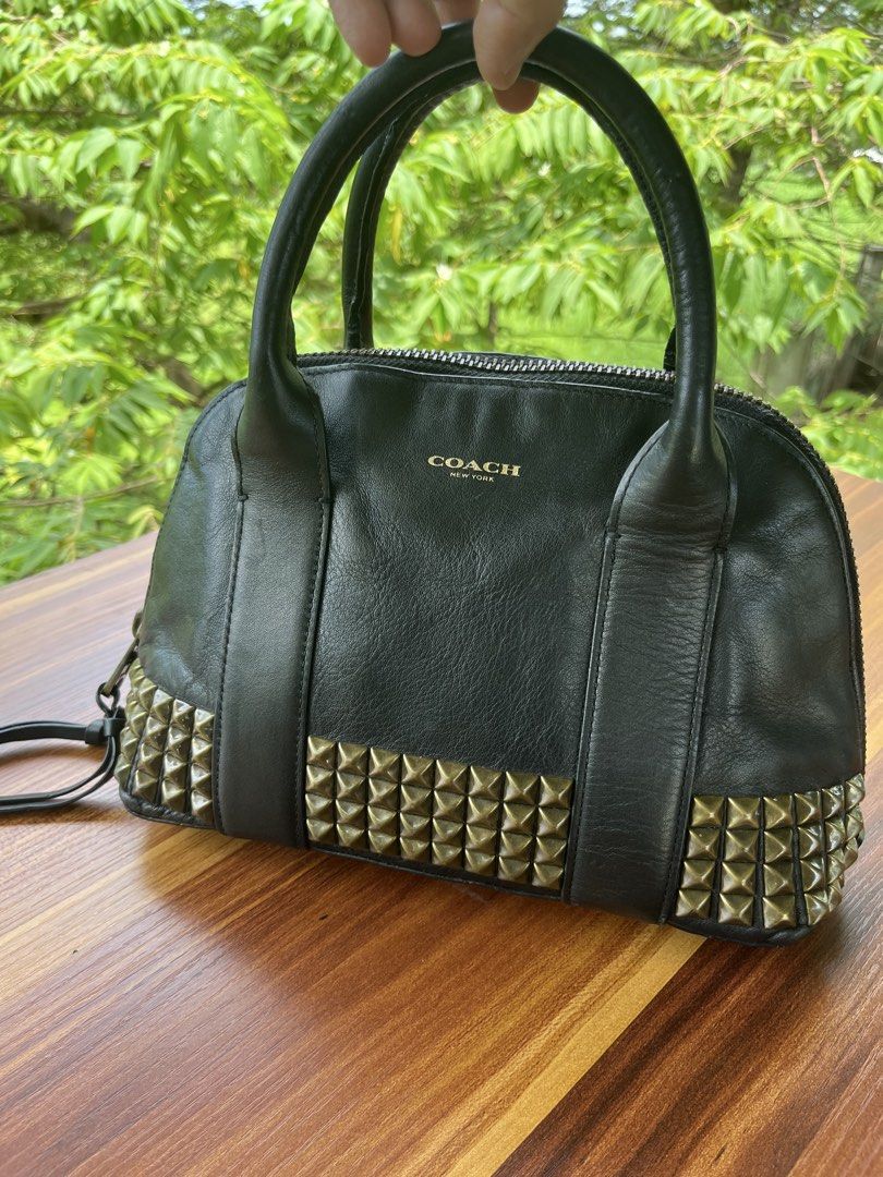 Coach handbag/sling bag (Category: Cross-body Bags) located in Oroquieta. Submitted by mightyfalcon.f3b3e6 (Listing ID 1465807604, Image 1). Description: near medium genuine leather ykk zip,intact code provided blak leather sling strap(tory burch) .