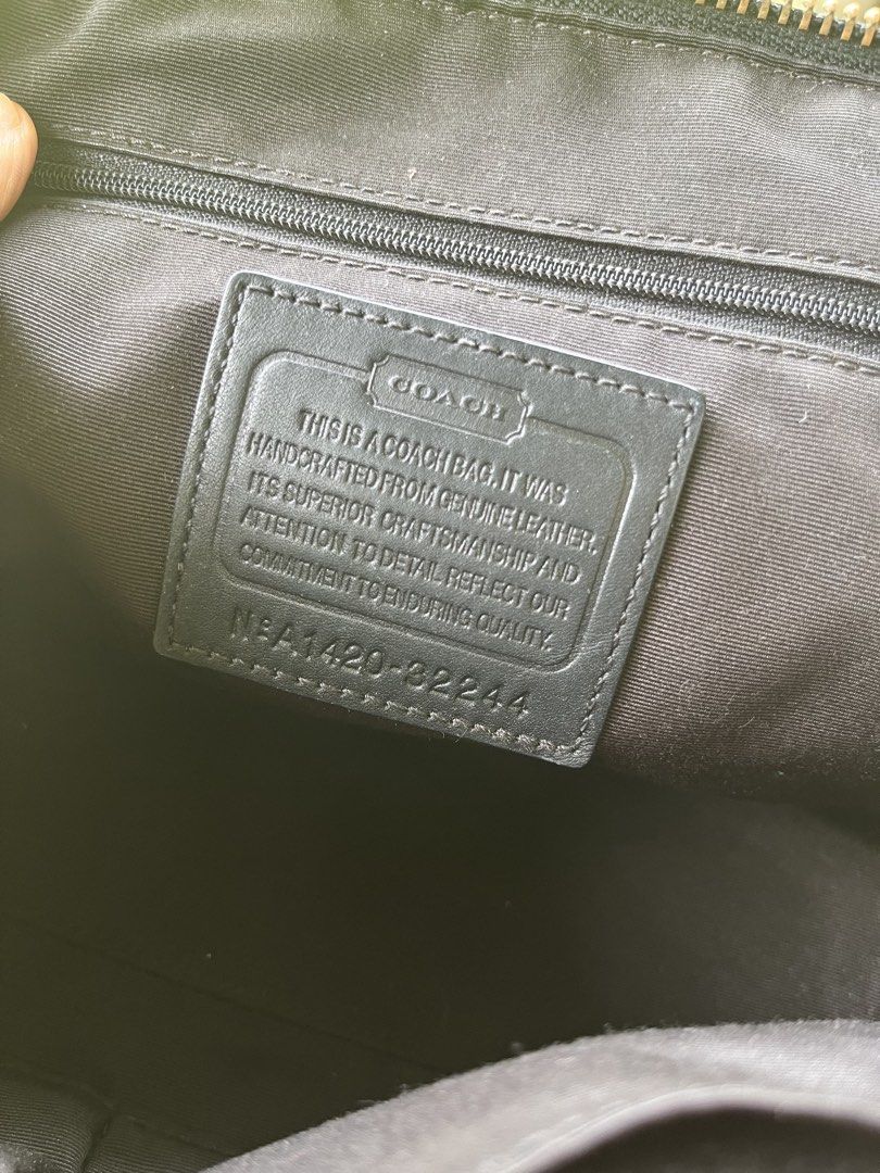 Coach handbag/sling bag (Category: Cross-body Bags) located in Oroquieta. Submitted by mightyfalcon.f3b3e6 (Listing ID 1465807604, Image 3). Description: near medium genuine leather ykk zip,intact code provided blak leather sling strap(tory burch) .