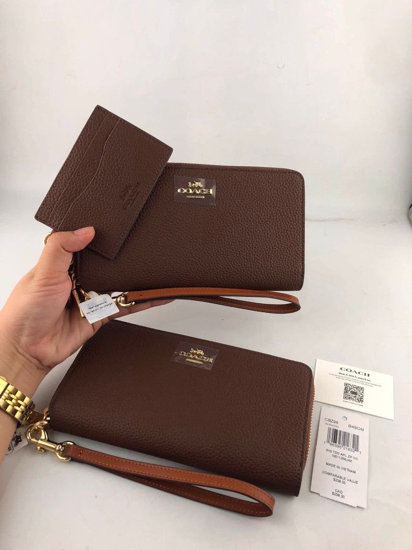 Coach Long Wallet with Cardcase (Category: Wallets & Card holders) located in Quezon City. Submitted by bagsboutiqueph (Listing ID 1465807245, Image 1). Description: LAST PRICE POSTED. LIMITED STOCKS! BRANDNEW WITH INCLUSIONS. COLOR MAY SLIGHTLY VARY IN ACTUAL DUE TO LIGHTING AND CAMERA SETTING. OTHER PHOTOS WILL BE SEND DURING PURCHASE AND FOR SURE BUYERS ONLY. WHEN IN DOUBT, DO NOT ORDER. THANK YOU..