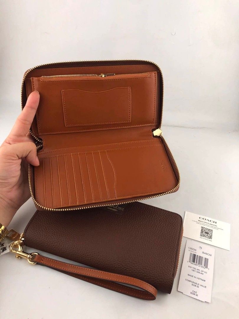 Coach Long Wallet with Cardcase (Category: Wallets & Card holders) located in Quezon City. Submitted by bagsboutiqueph (Listing ID 1465807245, Image 2). Description: LAST PRICE POSTED. LIMITED STOCKS! BRANDNEW WITH INCLUSIONS. COLOR MAY SLIGHTLY VARY IN ACTUAL DUE TO LIGHTING AND CAMERA SETTING. OTHER PHOTOS WILL BE SEND DURING PURCHASE AND FOR SURE BUYERS ONLY. WHEN IN DOUBT, DO NOT ORDER. THANK YOU..