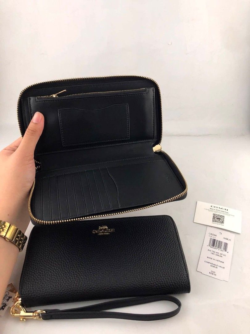 Coach Long Wallet with Cardcase in Black (Category: Wallets & Card holders) located in Quezon City. Submitted by bagsboutiqueph (Listing ID 1465807738, Image 2). Description: LAST PRICE POSTED. LIMITED STOCKS! BRANDNEW WITH INCLUSIONS. COLOR MAY SLIGHTLY VARY IN ACTUAL DUE TO LIGHTING AND CAMERA SETTING. OTHER PHOTOS WILL BE SEND DURING PURCHASE AND FOR SURE BUYERS ONLY. WHEN IN DOUBT, DO NOT ORDER. THANK YOU..