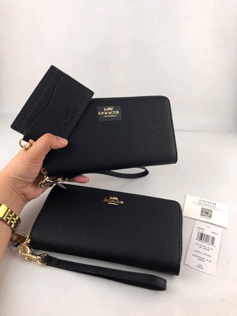 Coach Long Wallet with Cardcase in Black (Category: Wallets & Card holders) located in Quezon City. Submitted by bagsboutiqueph (Listing ID 1465807738, Image 1). Description: LAST PRICE POSTED. LIMITED STOCKS! BRANDNEW WITH INCLUSIONS. COLOR MAY SLIGHTLY VARY IN ACTUAL DUE TO LIGHTING AND CAMERA SETTING. OTHER PHOTOS WILL BE SEND DURING PURCHASE AND FOR SURE BUYERS ONLY. WHEN IN DOUBT, DO NOT ORDER. THANK YOU..