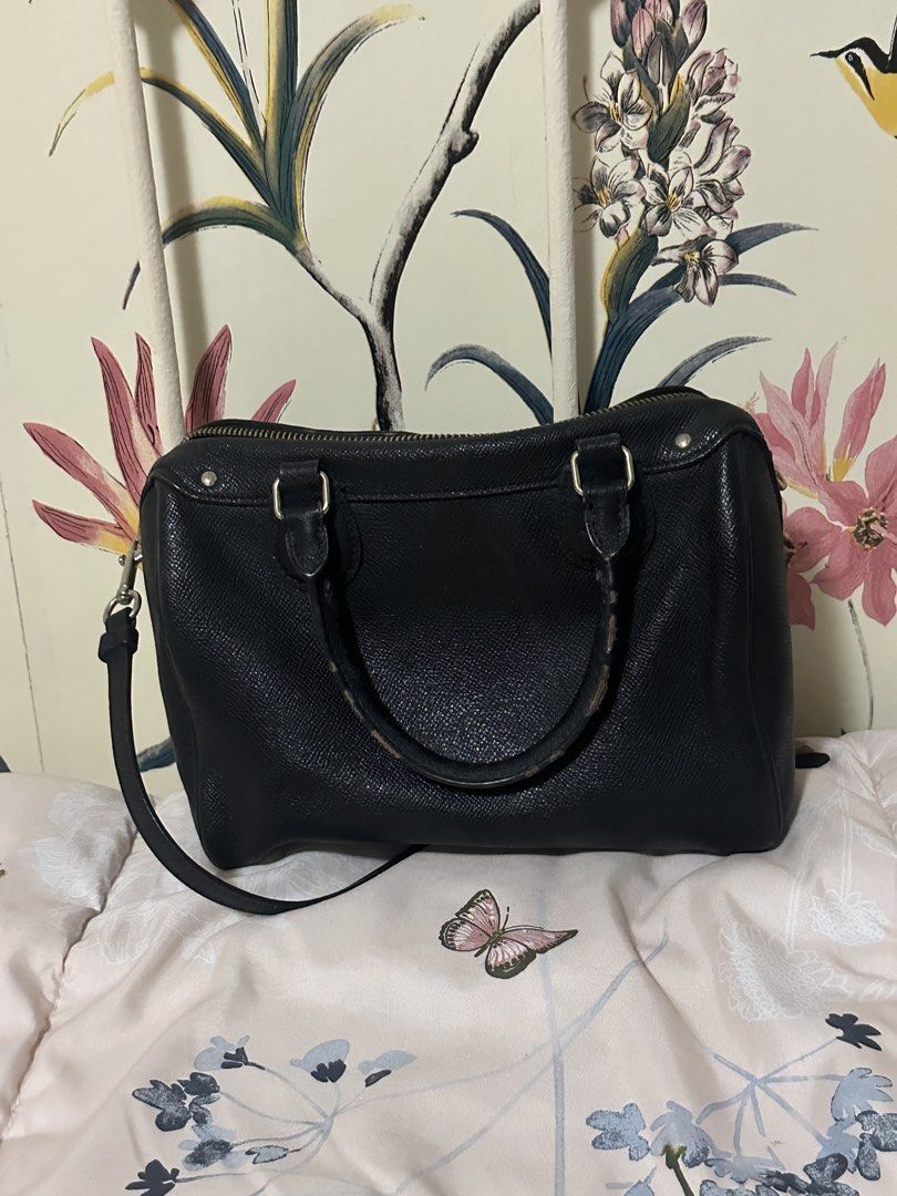 Coach Mini Bennett Satchel (Category: Luxury Bags & Wallets) located in Makati City. Submitted by biancak20 (Listing ID 1465897846, Image 3). Description: - Authentic black Coach satchel in pebbled leather - Gold-tone hardware and signature Coach hangtag included - Dual top handles plus a detachable shoulder strap for versatile wear - Secure zip-top closure with a fabric-lined interior and zip pocket - Spacious enough for your daily essentials li