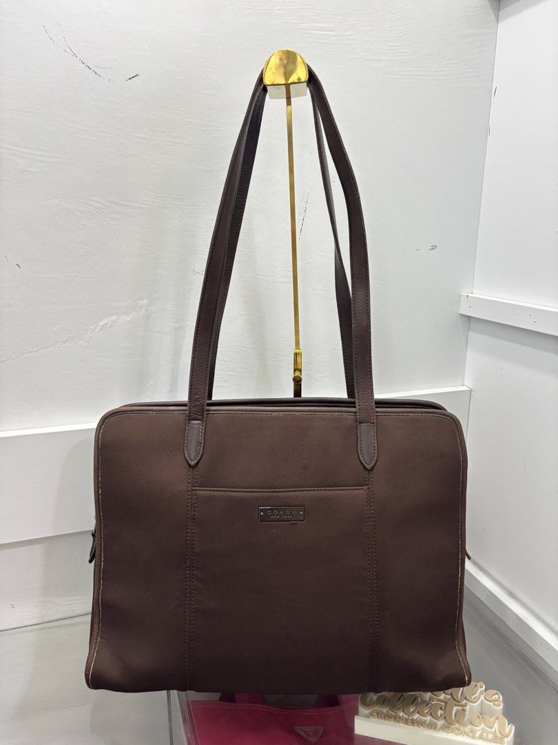 Coach Neoprene Chocobrown Tote (Category: Tote Bags) located in Cabanatuan. Submitted by cristalyngonzales (Listing ID 1465902057, Image 1). Description: Co ach Vintage Neoprene Chocobrown Tote bag 💯 2,300 Php flaws in the leather trimmings, pls see posted dets. still good for personal used 🥨.