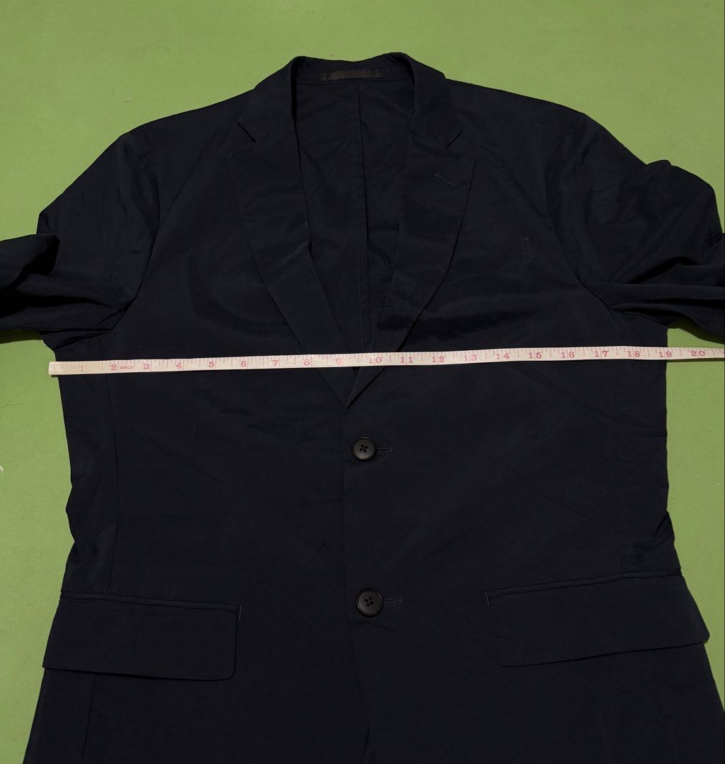 Coat (Category: Coats, Jackets and Outerwear) located in Pasig City. Submitted by reyeslarry11740 (Listing ID 1465815567, Image 3). Description: For Sale Uniqlo Blazer x Coat Slim Fit Men Navy Blue Size Small 19.1w x 27.5L Excellent to as new condition No issue 600 plus ship only Payment 1st Pasig city.