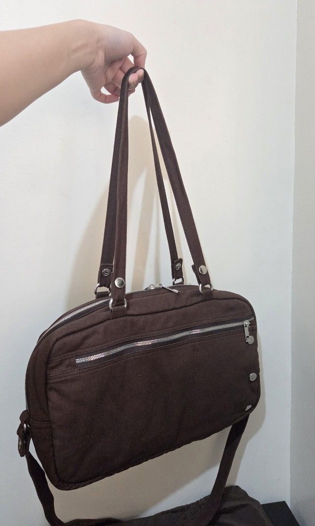 Cocoa Bowler Bag with Detachable Straps (Category: Shoulder Bags) located in Manila. Submitted by es.corner (Listing ID 1431288643, Image 1). Description: •Decluttering •Used only twice •Bowler Bag with dust bag •Cocoa color •Two-way zipper •Front zipper flap with three snap buttons •Detachable straps and extra shoulder strap •Fits 13-14 inch laptops Payment - Bank Transfer/Gcash SDD.